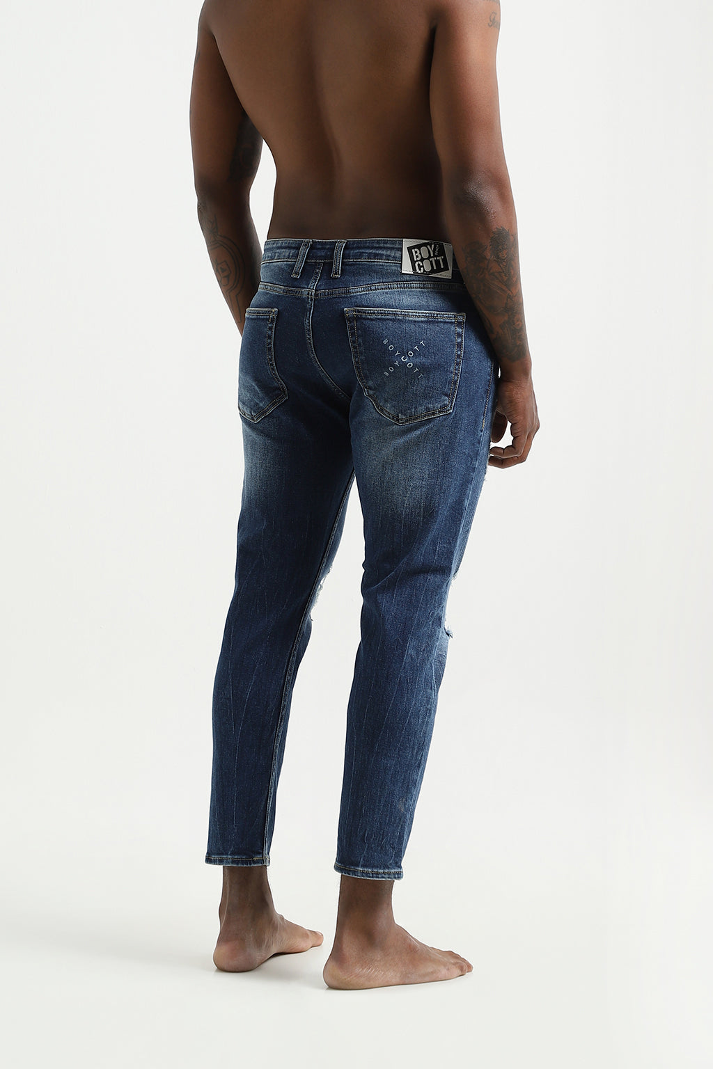 RIPPED ANKLE FIT JEANS